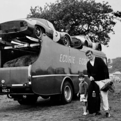 Jackie Stewart (GBR), right, with young motorsport enthusiast Keith Sutton (GBR), 4 years old, left. Behind them is the Ecurie Ecosse team transporter.
B.A.R.C./Express & Star Championship, Oulton Park, England. 31 August 1963.